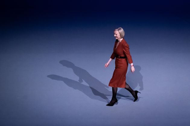 Liz Truss walks onstage at the Conservative Party annual conference in Birmingham. 