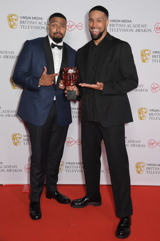 Jordan Banjo (L) and Ashley Banjo with their Bafta.