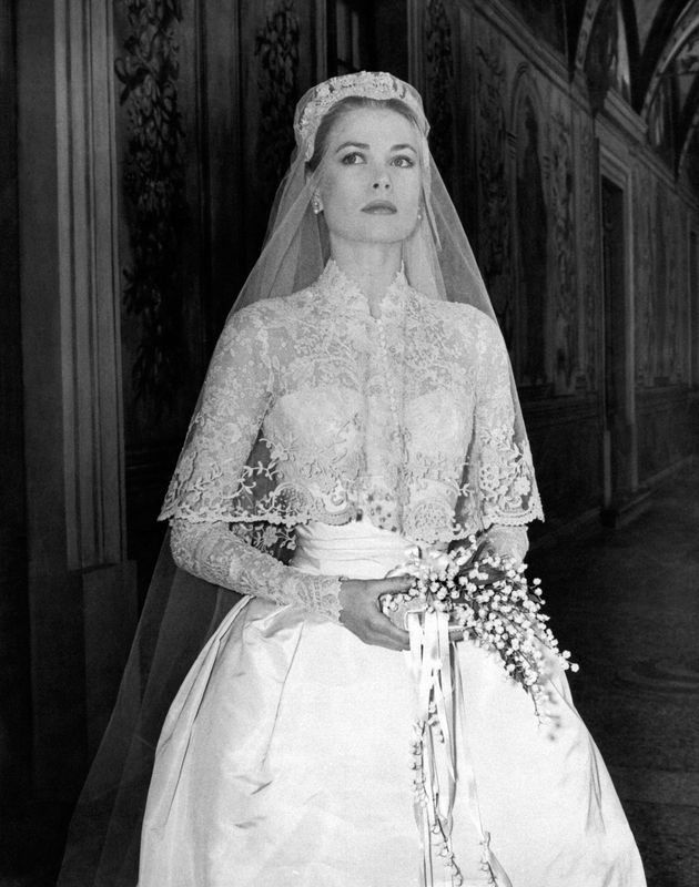 The film star Grace Kelly photographed in her bridal dress. 