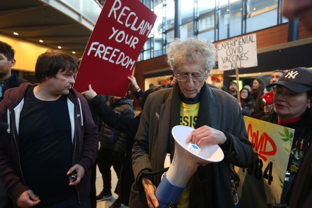 <strong>Piers Corbyn and protesters forcibly enter the theatre to protest against vaccine passports.</strong>