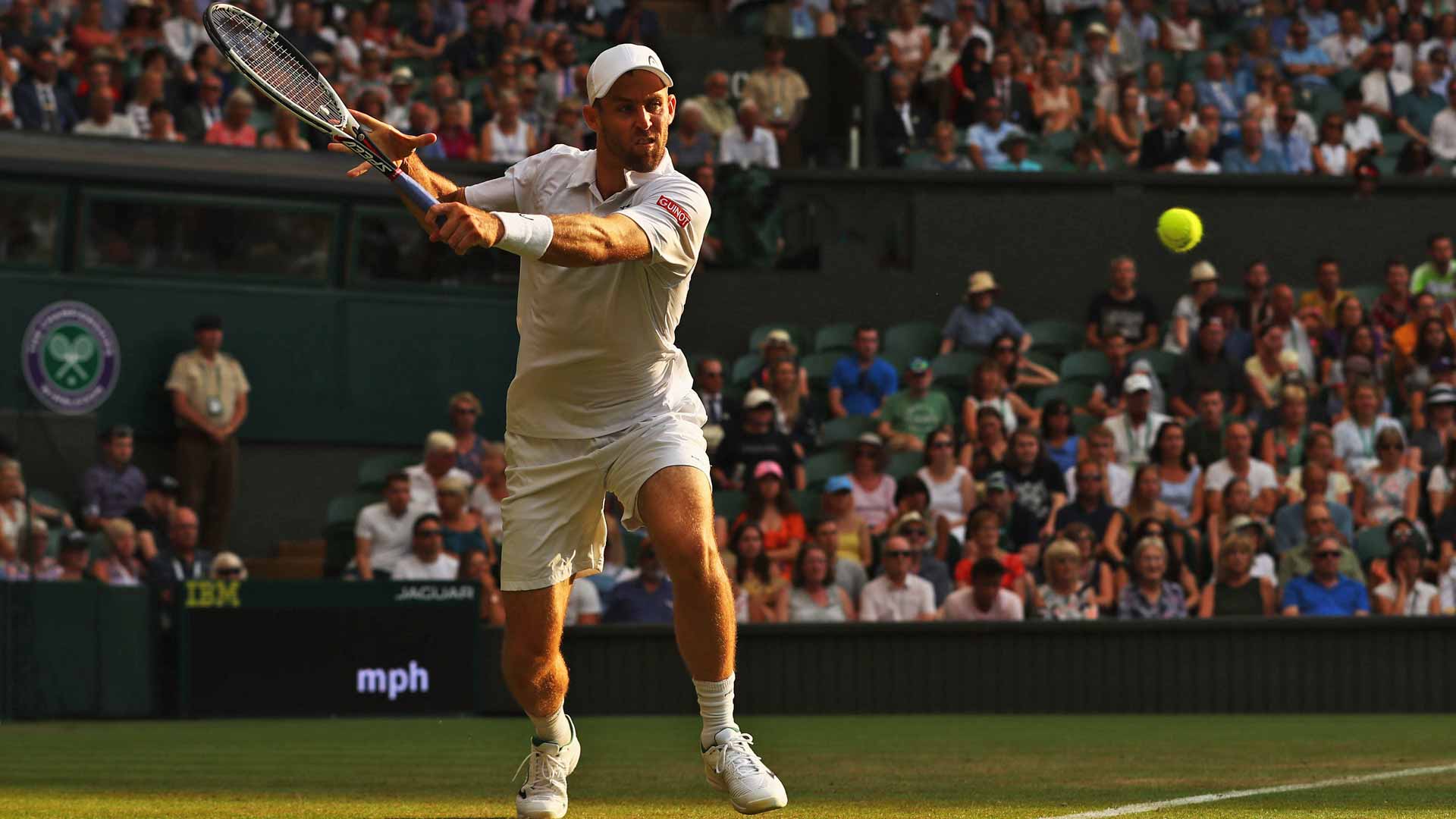 Bradley Klahn faces Kyle Edmund on Centre Court at Wimbledon in 2018.
