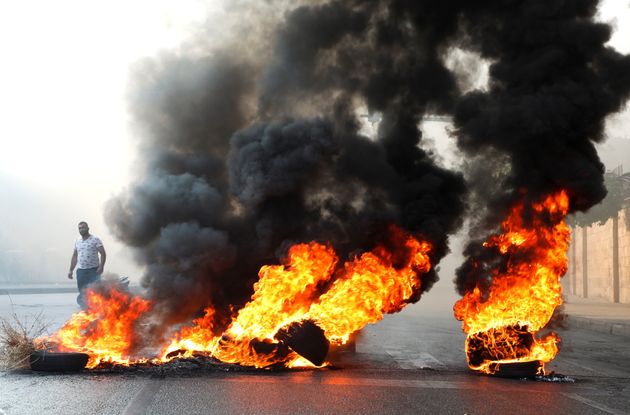 A protester in July demonstrating against the Lebanese government