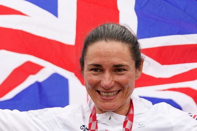 <strong>Great Britain's Sarah Storey celebrates with the gold medal in the Women's C5 time trial.</strong>