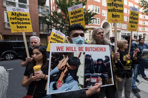 Demonstrators including Afghan people protesting outside the Home Office demanding a safe passage to the UK for the refugees fleeing Afghanistan