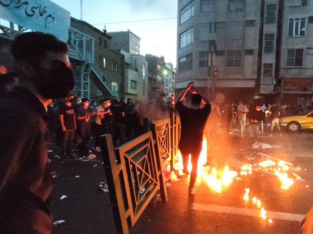 A picture obtained by AFP outside Iran on Sept. 21, shows Iranian demonstrators taking to the streets of the capital Tehran during a protest for Mahsa Amini, days after she died in police custody. 