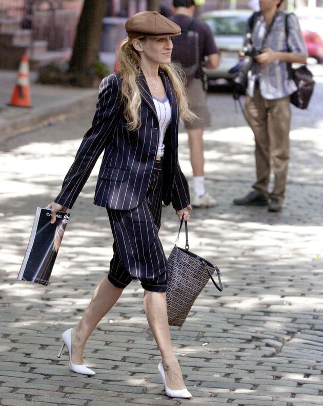 Parker wears a newsboy suit while filming Sex and the City in New York in May 2001.