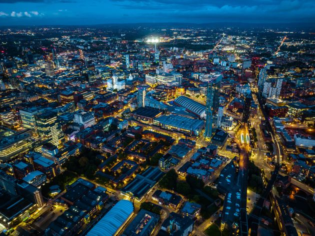 Aerial view of Manchester city in UK at night