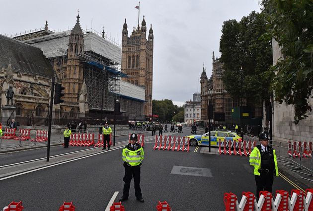 Members of Parliament walk from the Houses of Parliament to attend a service to pay tribute to Amess