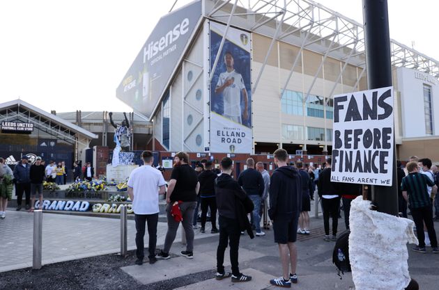 Fans protest against the European Super League outside the stadium prior to the Premier League match between Leeds United and Liverpool at Elland Road on April 19