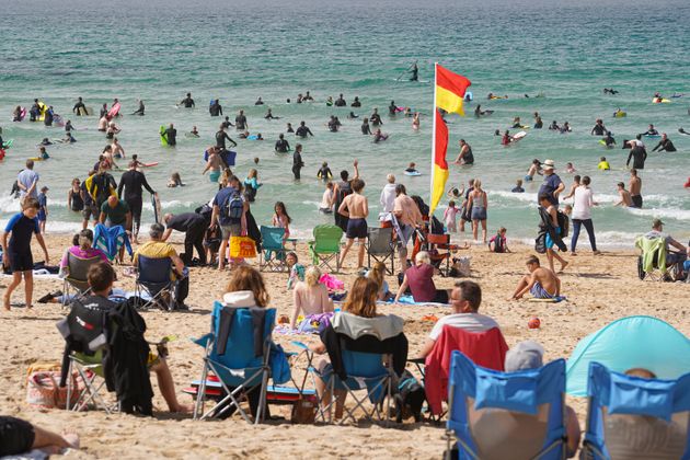 <strong>Holidaymakers on Fistral Beach in Newquay, Cornwall, England. </strong>