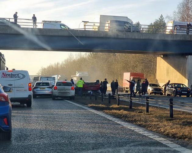 <strong>The scene at Bowburn interchange on the A1(M) as a passenger has been flown to hospital after a car fell from a bridge and landed in the middle of the busy motorway.</strong>