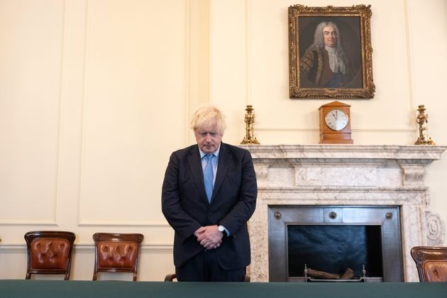 Boris Johnson marking the 11am silence for victims of the Plymouth shooting. 