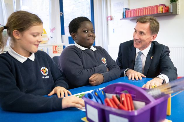 Chancellor of the exchequer Jeremy Hunt meets pupils at St Jude’s Church of England primary school in south London after delivering his autumn statement to parliament.