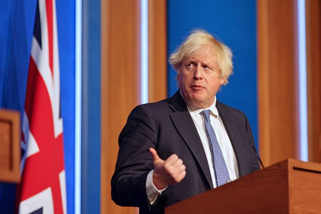 <strong>Boris Johnson speaking at a press conference in Downing Street after ministers met to consider imposing new restrictions in response to rising cases and the spread of the Omicron variant.</strong>