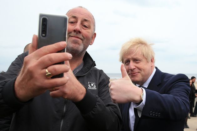 <strong>Boris Johnson poses for a 'selfie' photograph as he meets members of the public while campaigning in Hartlepool.</strong>