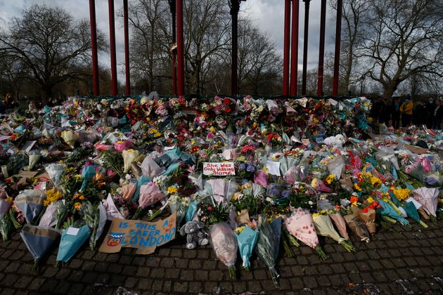 Flowers and candles placed on Clapham Common for Sarah Everard on March 14, 2021. 