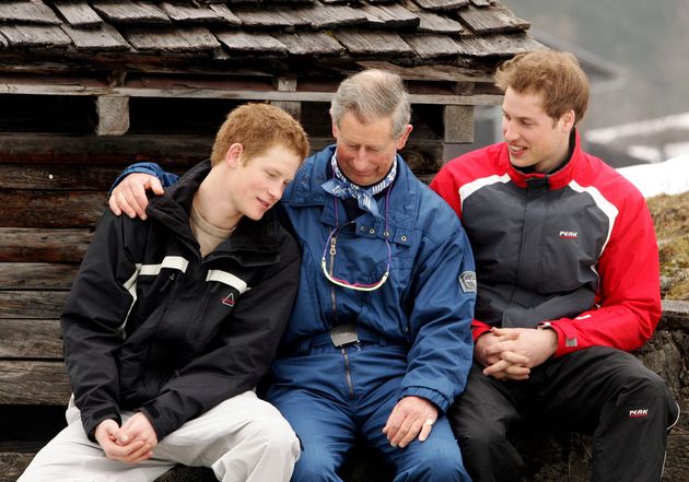 The boys with their father Prince Charles during a 2005 ski trip in Switzerland.