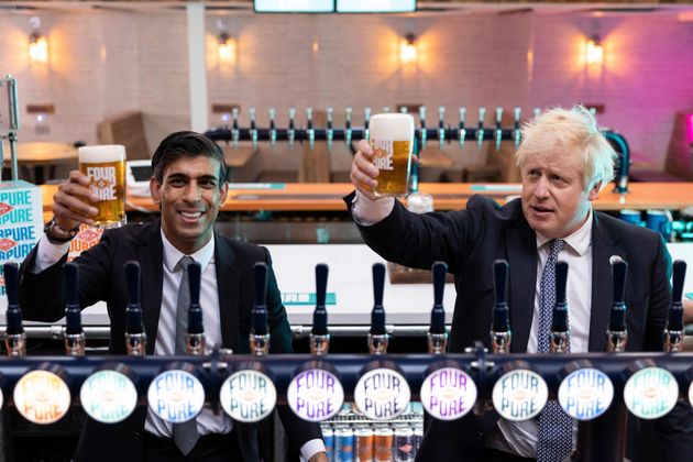 <strong>Boris Johnson and Rishi Sunak raise a pint as they visit Fourpure Brewery in Bermondsay, London, following the budget.</strong>