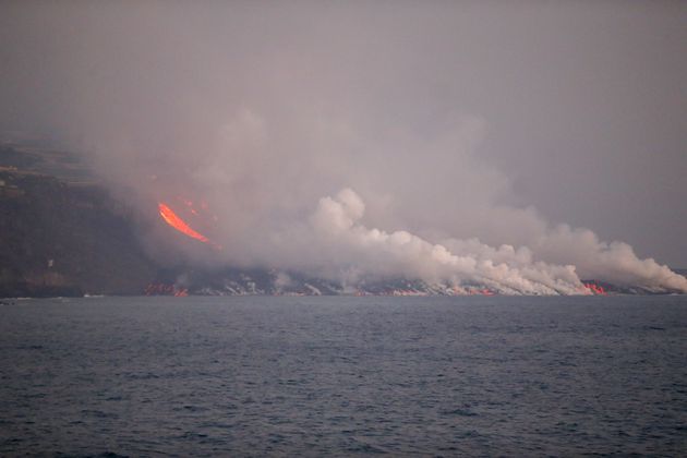 Lava flowing from a volcano that devastated the Spanish island of La Palma continue to flow to the Atlantic Ocean on Thursday