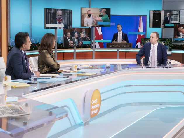 Adil Ray, Susanna Reid and Matt Hancock in the GMB studio