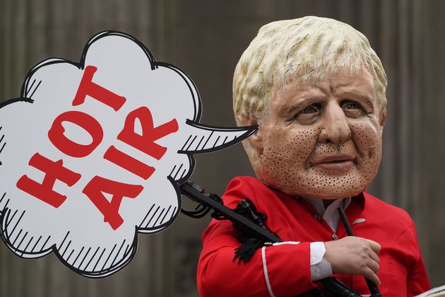 Environmental campaigners gather in Royal Exchange Square, Glasgow, on day one of the summit.