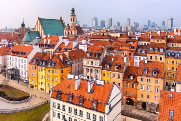 Warsaw's old town with more modern towers in the distance