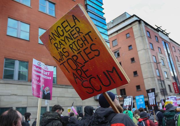 A protester holds a placard during the demonstration