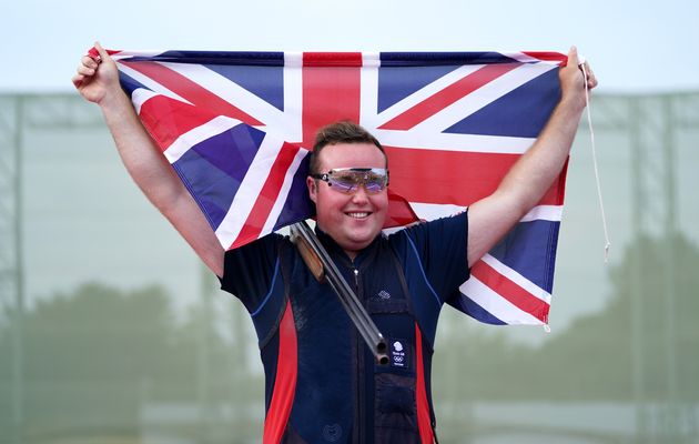 Matthew Coward-Holley celebrates after his bronze in the Trap Men's final