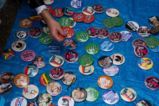 A woman picks out a button in Washington, D.C.