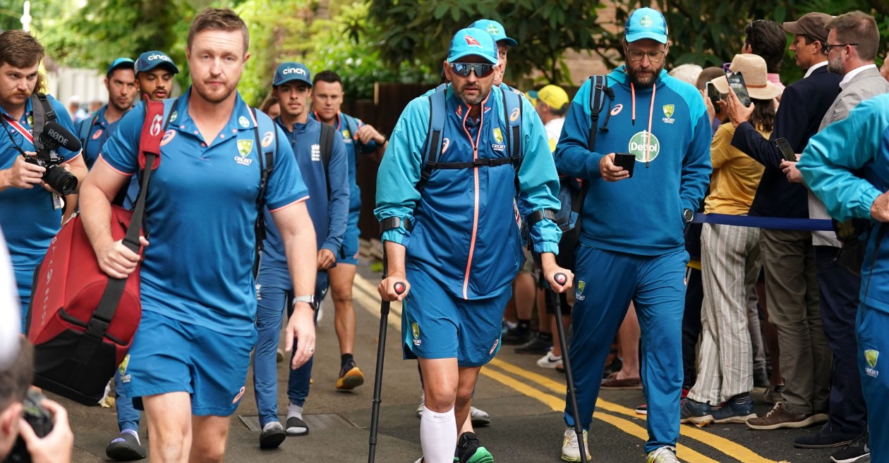 Nathan Lyon walking in crutches