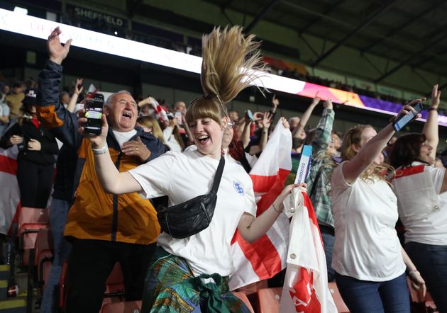 England fans celebrate the Lionesses' win against Sweden in the Euro semi-finals