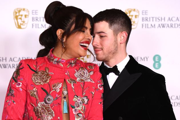 Priyanka Chopra Jonas with her husband Nick Jonas at the British Academy Film Awards 2021.