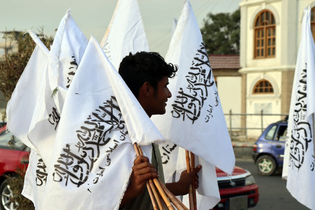 <strong>A man sells Taliban flags in Kabul.</strong>