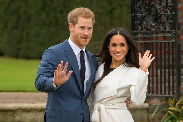 Prince Harry and Meghan Markle in the Sunken Garden at Kensington Palace, London, after the announcement of their engagement.