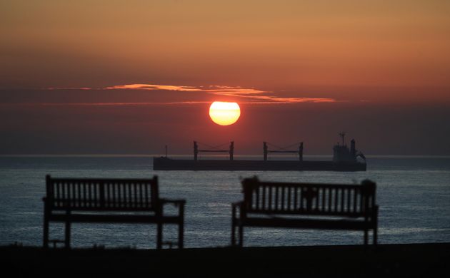 The sun rises over the North East coast at Tynemouth. 