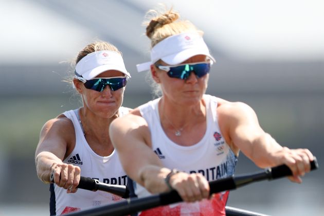 Helen Glover and Polly Swann compete during the Women's Pair heats on the first day of the games.