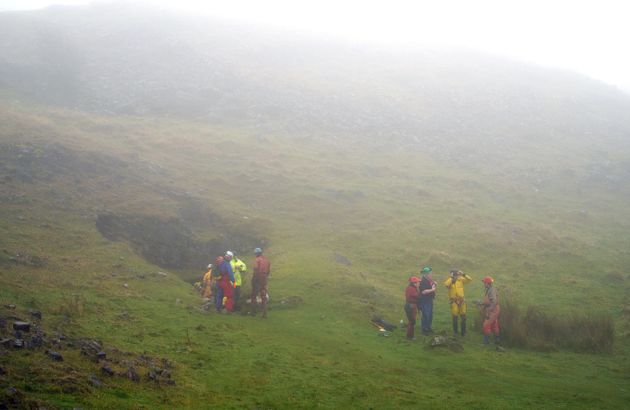 <strong>Rescuers at the entrance of the Ogof Ffynnon Ddu cave system near Penwyllt, Powys in the Brecon Beacons, Wales.</strong>