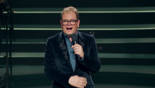 Alan sang on stage for the crowd at the London Palladium