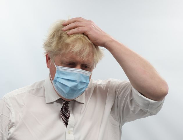 <strong>Boris Johnson talks to staff during a visit to the Finchley Memorial Hospital in North London on Tuesday.</strong>