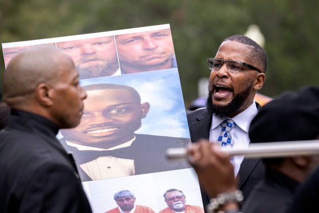 Dozens of Black Lives Matter and Black Panther protesters gathered outside the Glynn County Courthouse where the trial of Travis McMichael, Gregory McMichael and William 