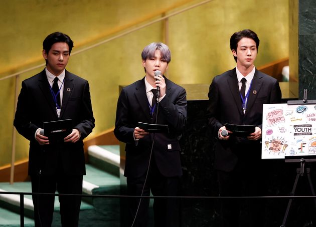 (L to R) V, Suga and Jin of South Korean boy band BTS speak in UN General Assembly Hall at the United Nations Headquarters, in New York.