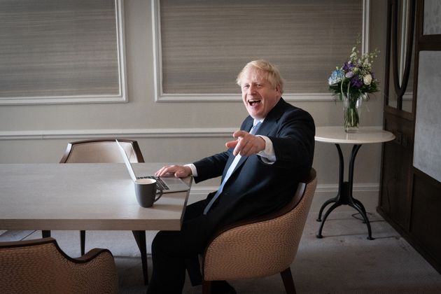 <strong>Boris Johnson prepares his keynote speech in his hotel room in Manchester before addressing the Conservative Party Conference on Wednesday.</strong>