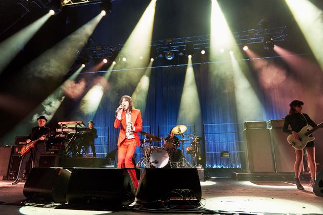 Primal Scream performing in 2016, with Duffy pictured on keyboards