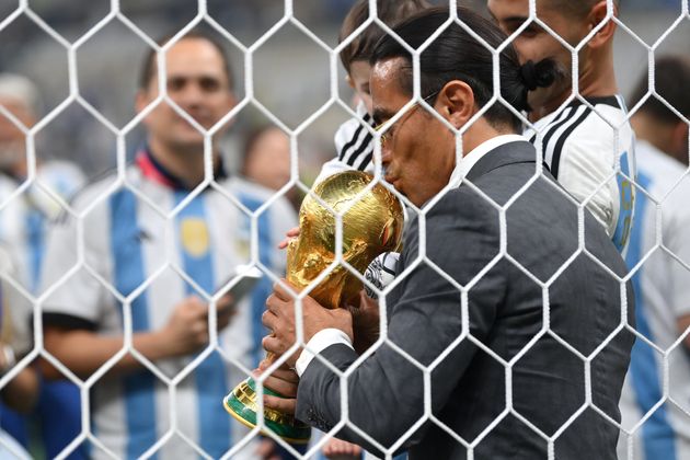 Nusret Goekce, nicknamed Salt Bae, kisses the World Cup after the final between Argentina and France in Lusail City, Qatar.