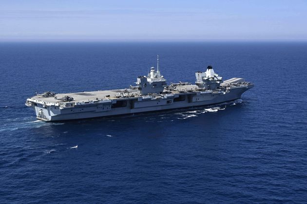 The Royal Navy's aircraft carrier HMS Queen Elizabeth sails during the Navy exercise 