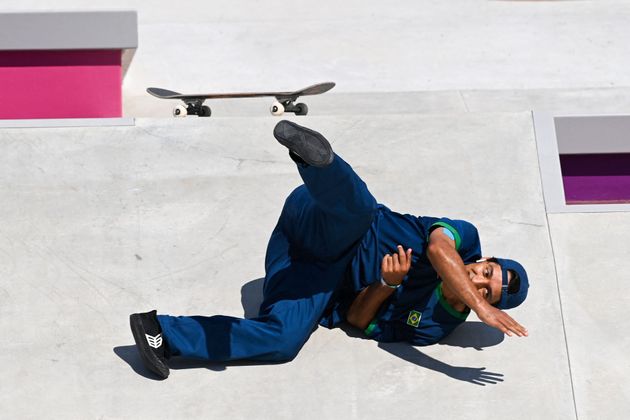 Brazil's Kelvin Hoefler takes a fall as he competes in the men's street prelims heat 2.