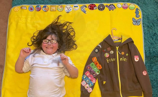 Freya-Rose with her pride and joy – her Brownies uniform.