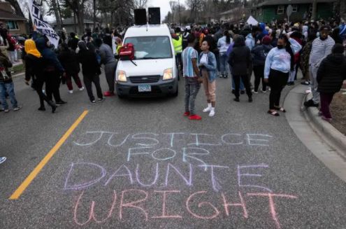 People gather in protest in Brooklyn Centre in the name of Duante Wright 