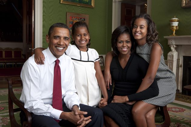 The Obama family sits for a portrait in the Green Room of the White House on Sept. 1, 2009.