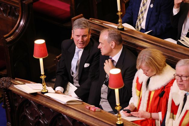 Lib Dem leader Sir Ed Davey talks with Labour leader Sir Keir Starmer in Westminster Abbey ahead of the Coronation of King Charles III.